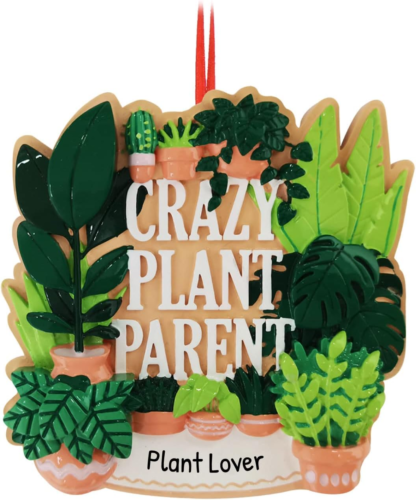 Christmas tree ornament that states Crazy Plant Parent. It is surrounded by various plants with the label plant lover at the bottom.