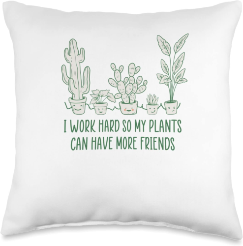 A decorative pillow with an image of different plants on it stating I work hard so my plants can have more friends.