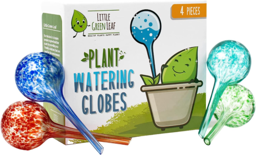 Plant watering globes and their packaging that includes 4 pieces